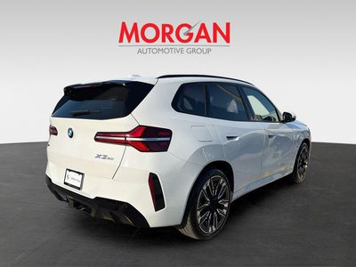 2025 BMW X3 — rear three-quarter view