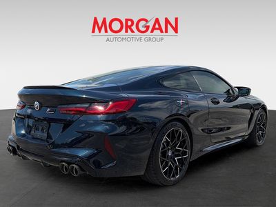 2023 BMW M8 — rear three-quarter view