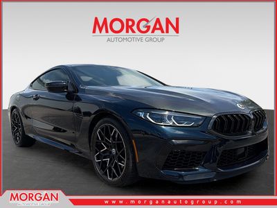 2023 BMW M8 Competition in Petrol Mica Metallic — front three-quarter view