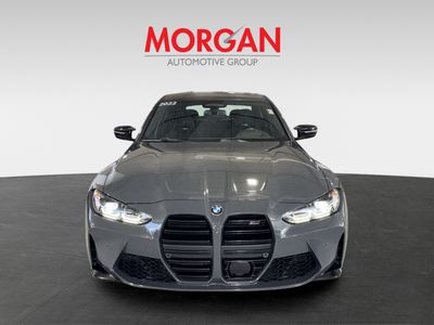 2022 BMW M3 — rear three-quarter view