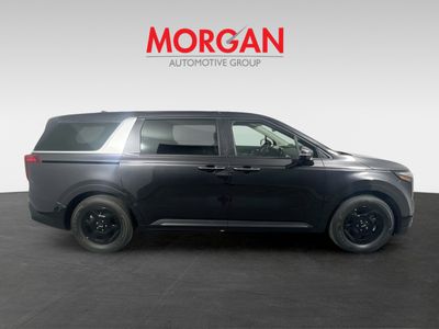 2026 Kia Carnival — side profile view