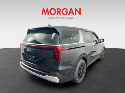 2026 Kia Carnival — rear three-quarter view
