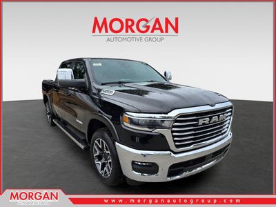 2026 Ram 1500 Laramie in Diamond Black Crystal Pearlcoat — front three-quarter view