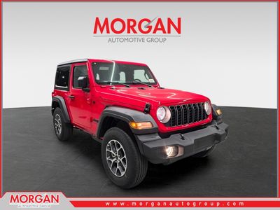 2026 Jeep Wrangler Sport S in Firecracker Red Clearcoat — front three-quarter view