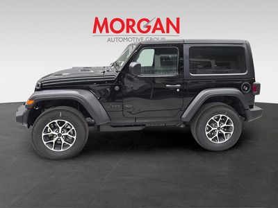 2026 Jeep Wrangler — rear three-quarter view