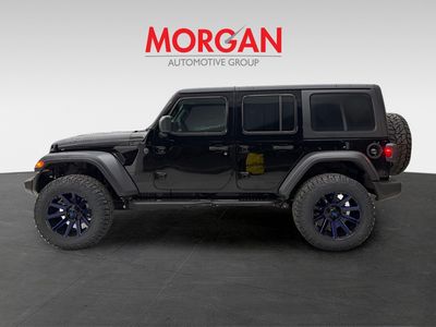 2026 Jeep Wrangler — rear three-quarter view