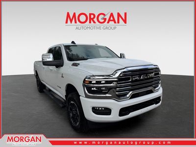 2026 Ram 3500 Laramie in Bright White Clearcoat — front three-quarter view