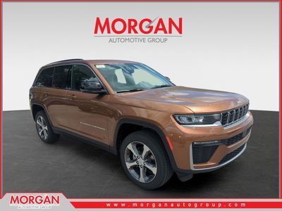 2026 Jeep Grand Cherokee Limited in Orange — front three-quarter view