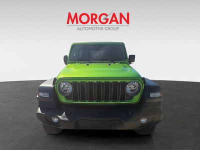 2026 Jeep Wrangler — rear three-quarter view