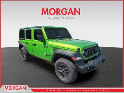 2026 Jeep Wrangler Sport in Green — front three-quarter view