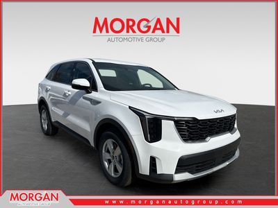 2026 Kia Sorento LX in Glacial White Pearl — front three-quarter view