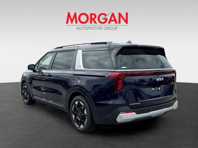 2026 Kia Carnival — rear three-quarter view