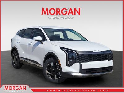 2026 Kia Sportage LX in Glacial White Pearl — front three-quarter view