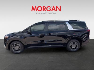 2026 Kia Carnival Hybrid — side profile view