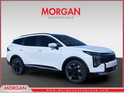 2026 Kia Sportage SX-Prestige in Glacial White Pearl — front three-quarter view