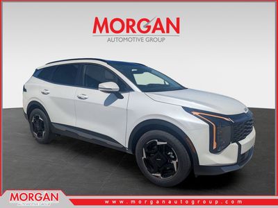 2026 Kia Sportage Hybrid EX in Snow White Pearl — front three-quarter view