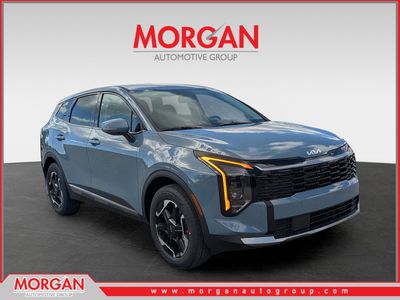 2026 Kia Sportage Hybrid S in Heritage Blue — front three-quarter view