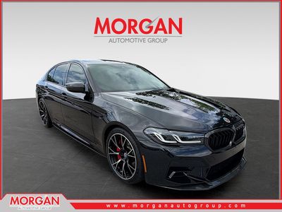 2023 BMW M5 Base in Black Sapphire Metallic — front three-quarter view