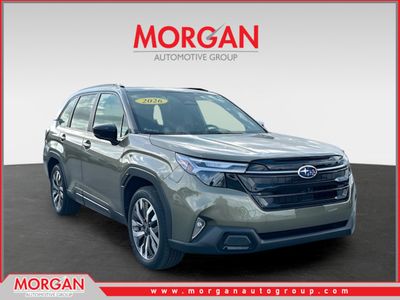 2026 Subaru Forester Touring in Brown — front three-quarter view
