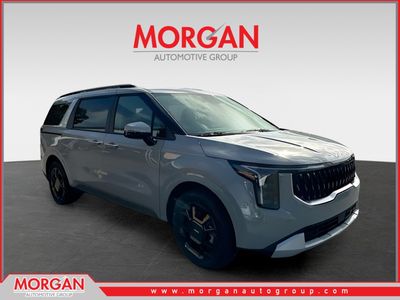2026 Kia Carnival Hybrid EX in Silver — front three-quarter view