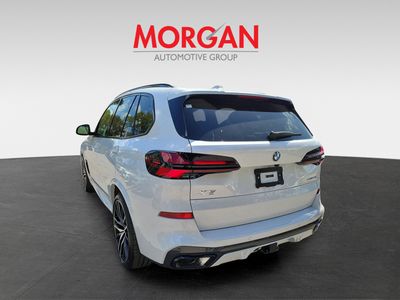 2026 BMW X5 — rear three-quarter view