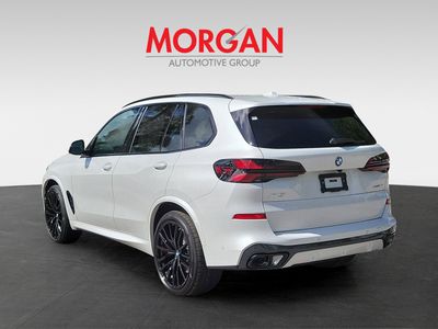 2026 BMW X5 — rear three-quarter view