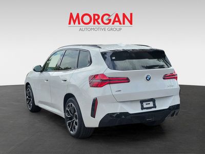 2026 BMW X3 — rear three-quarter view