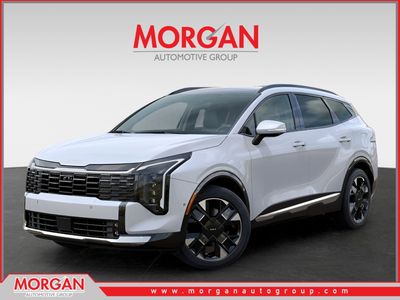 2026 Kia Sportage SX-Prestige in Glacial White Pearl — front three-quarter view