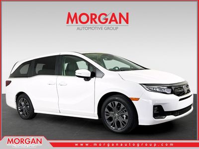 2026 Honda Odyssey Touring in Platinum White Pearl — front three-quarter view