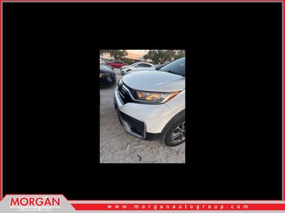 2022 Honda CR-V EX-L in Platinum White Pearl — front three-quarter view