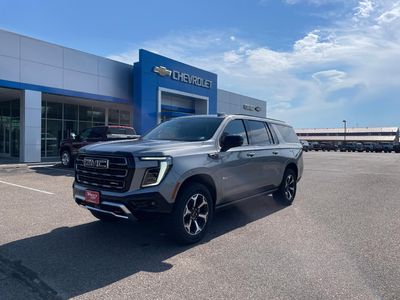 2026 GMC Yukon XL — rear three-quarter view