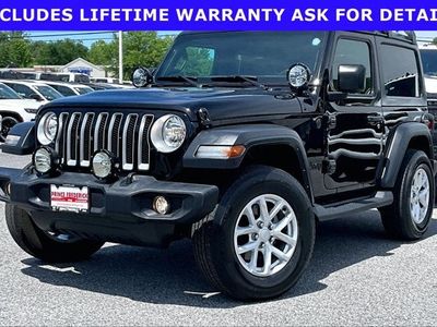 2023 Jeep Wrangler — rear three-quarter view