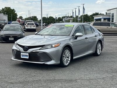 2020 Toyota Camry — rear three-quarter view