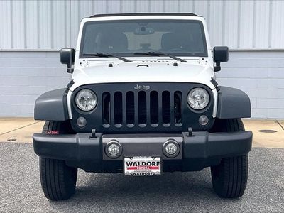 2016 Jeep Wrangler — rear three-quarter view