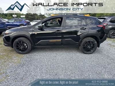 2026 Subaru CROSSTREK — rear three-quarter view