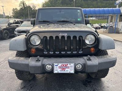 2011 Jeep Wrangler — side profile view