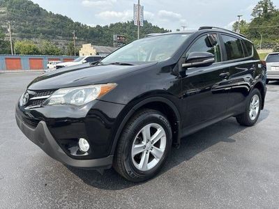 2013 Toyota RAV4 — rear three-quarter view