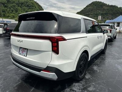 2026 Kia Carnival — rear three-quarter view