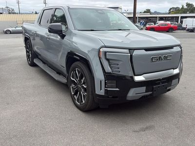2025 GMC Sierra EV — rear three-quarter view