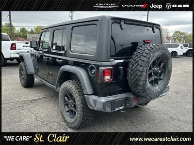 2026 Jeep Wrangler — rear three-quarter view