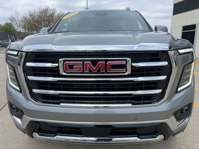 2026 GMC Yukon XL — rear three-quarter view