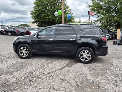 2013 GMC Acadia — rear three-quarter view