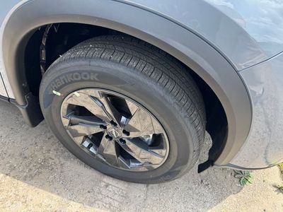 2026 Nissan Rogue — rear three-quarter view