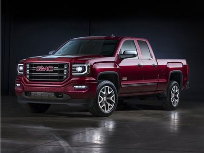 2016 GMC Sierra 1500 SLT in Light Steel Gray Metallic — front three-quarter view