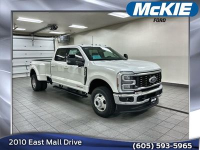 2026 Ford F-350SD Lariat in Star White Metallic Tri-Coat — front three-quarter view