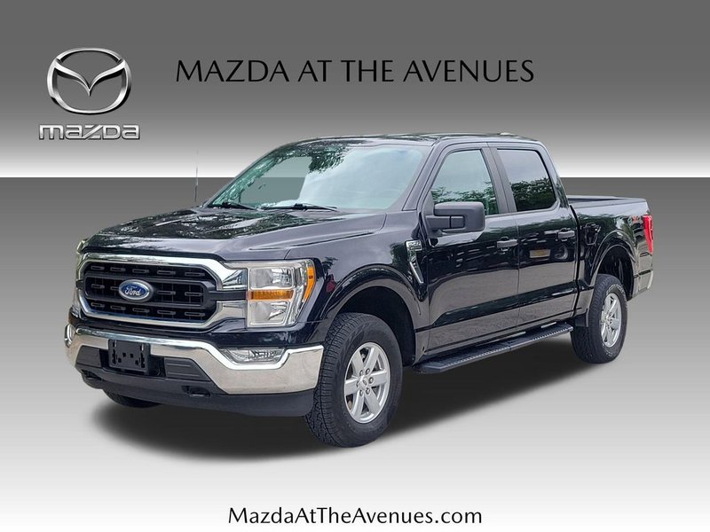 2021 Ford F-150 XLT in Black — front three-quarter view