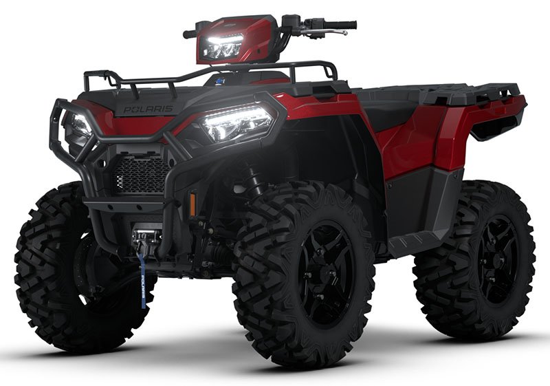 2026 Polaris Sportsman 570 Trail A26SHY57AS in Sunset Red — front three-quarter view