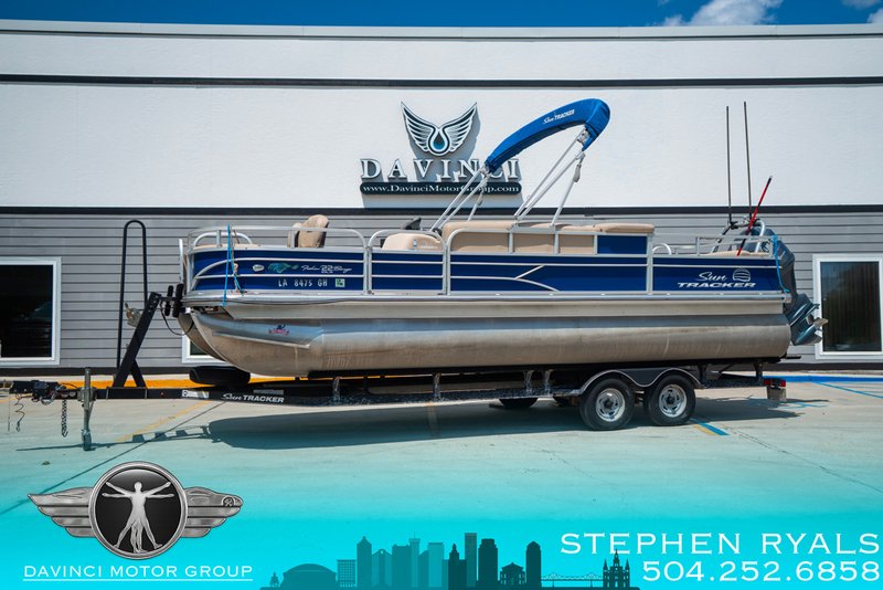 2017 Sun Tracker 22DLX Fishing Barge in Blue / Tan — front three-quarter view