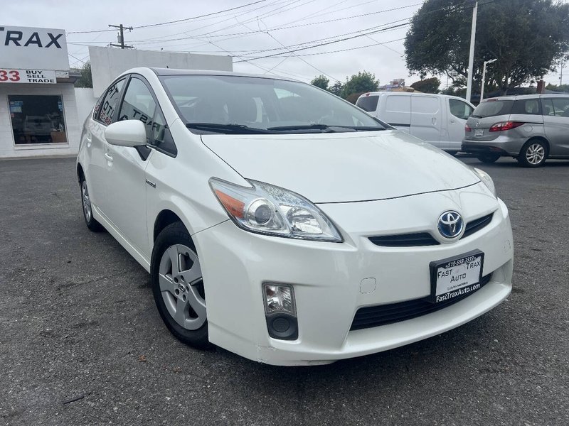 2011 Toyota Prius in Blizzard Pearl — front three-quarter view