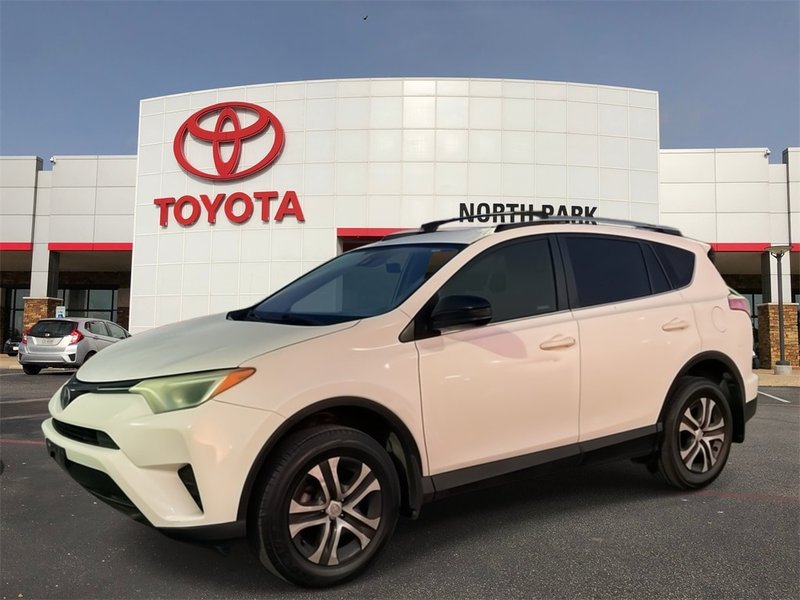 2018 Toyota RAV4 LE in Super White — front three-quarter view
